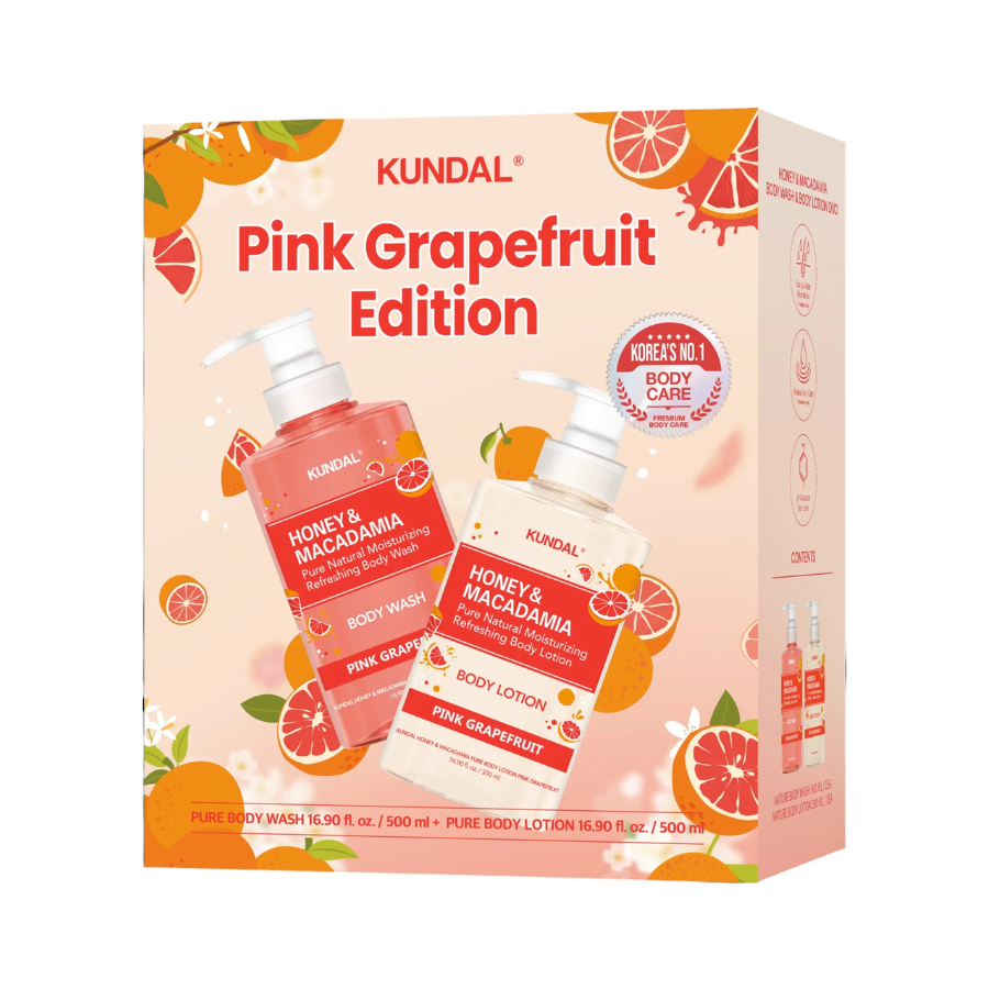 Kundal Pink Grapefruit Edition kropspleje sæt med body wash og body lotion, omgivet af frisk pink grapefrugt og citrusfrugter.